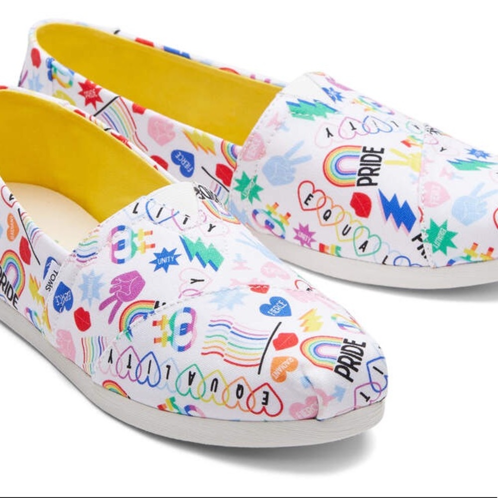 Toms “love wins” slip ons. Brand new in box!